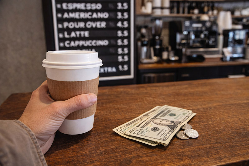 Coffee Spending Tracker Excel template showing daily coffee cost, monthly totals, and 5-year savings projection